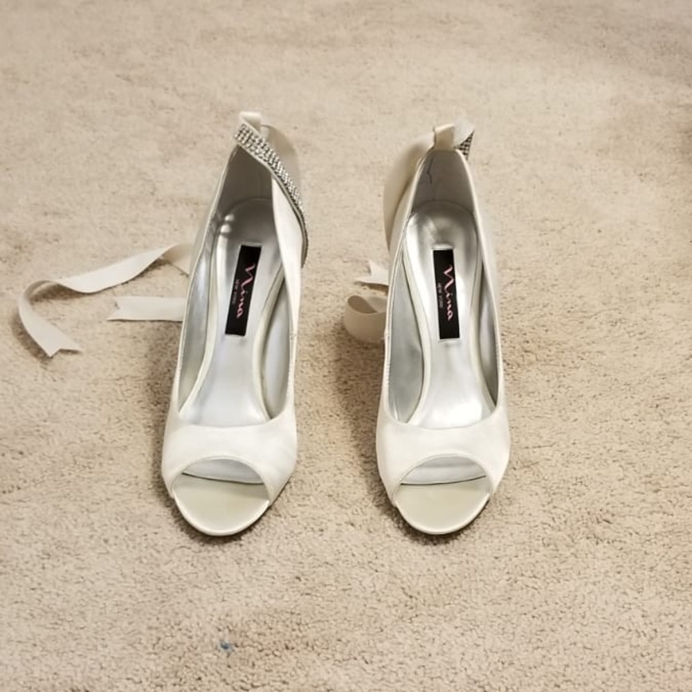 Nina wedged ivory pumps